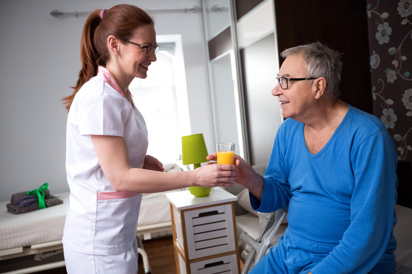 Caregiver with an elderly patient