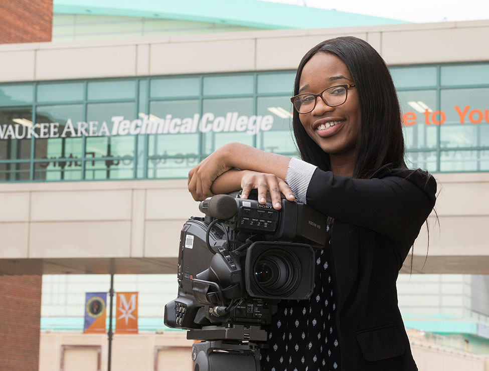 MATC student smiling with film equipment