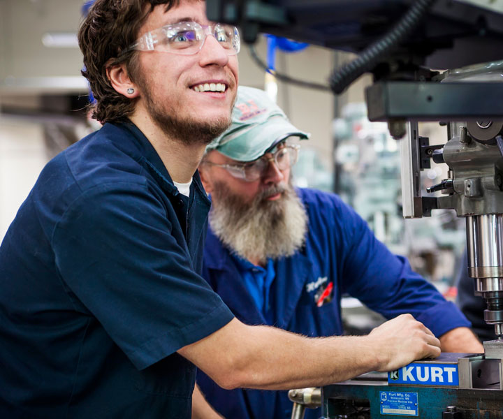 People working with machines