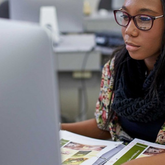 Student working on desktop computer