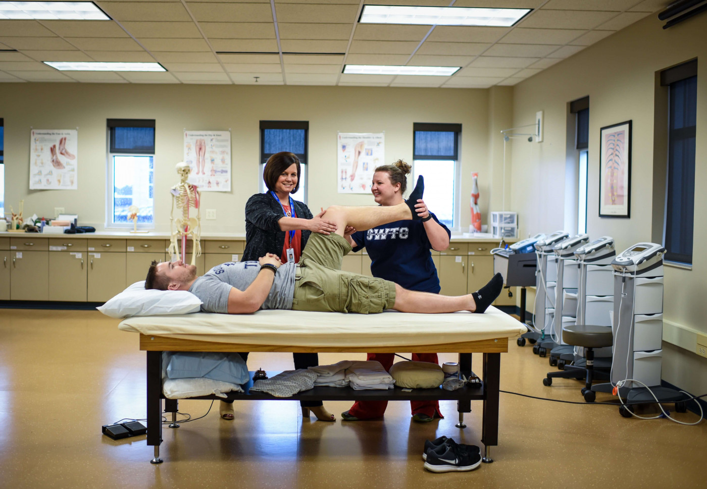 physical therapist assistant working on a patient
