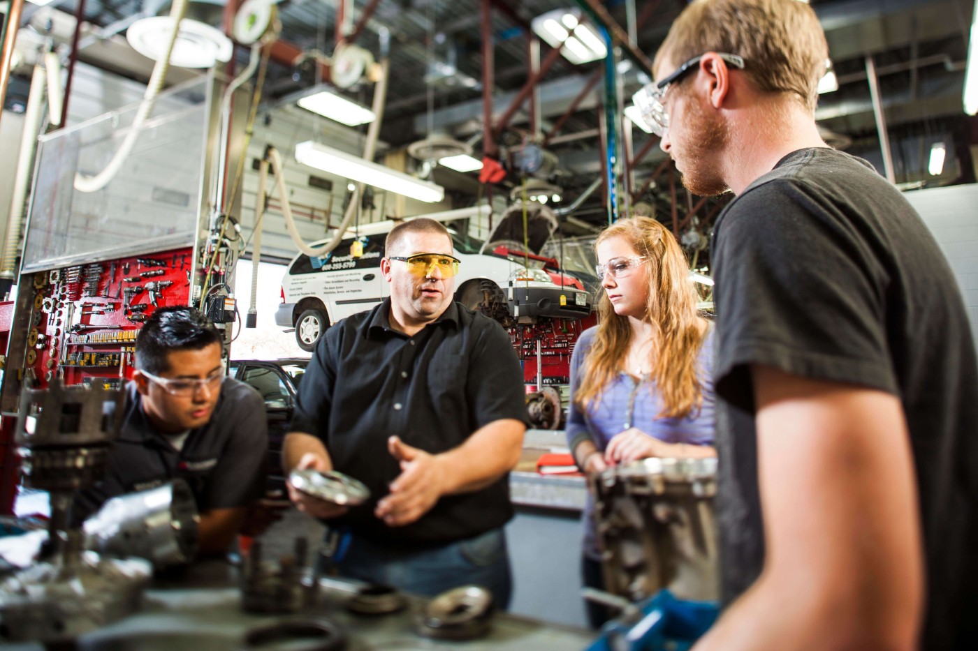 Auto Technicians learning by doing