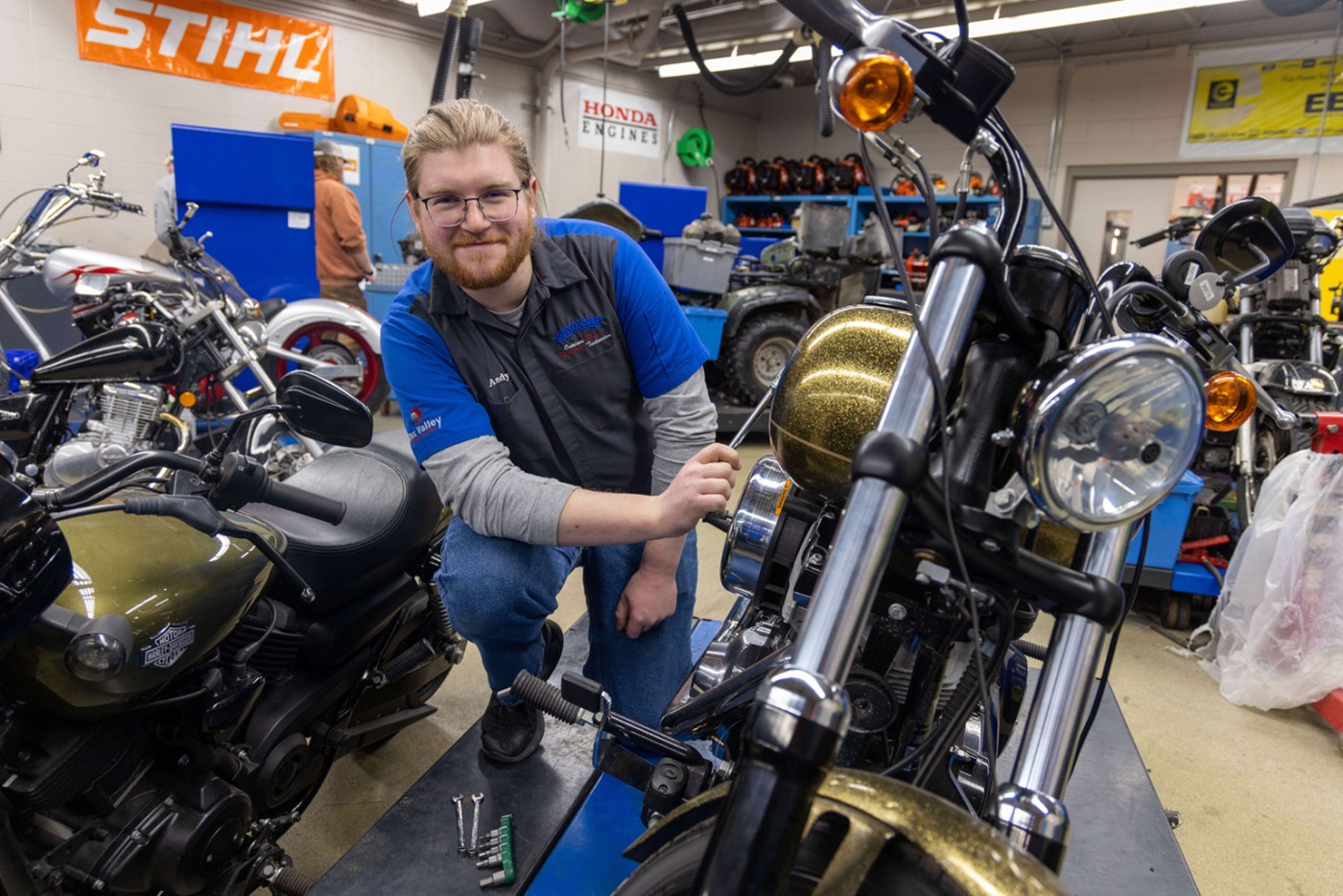 Man working oon motorcycle repair