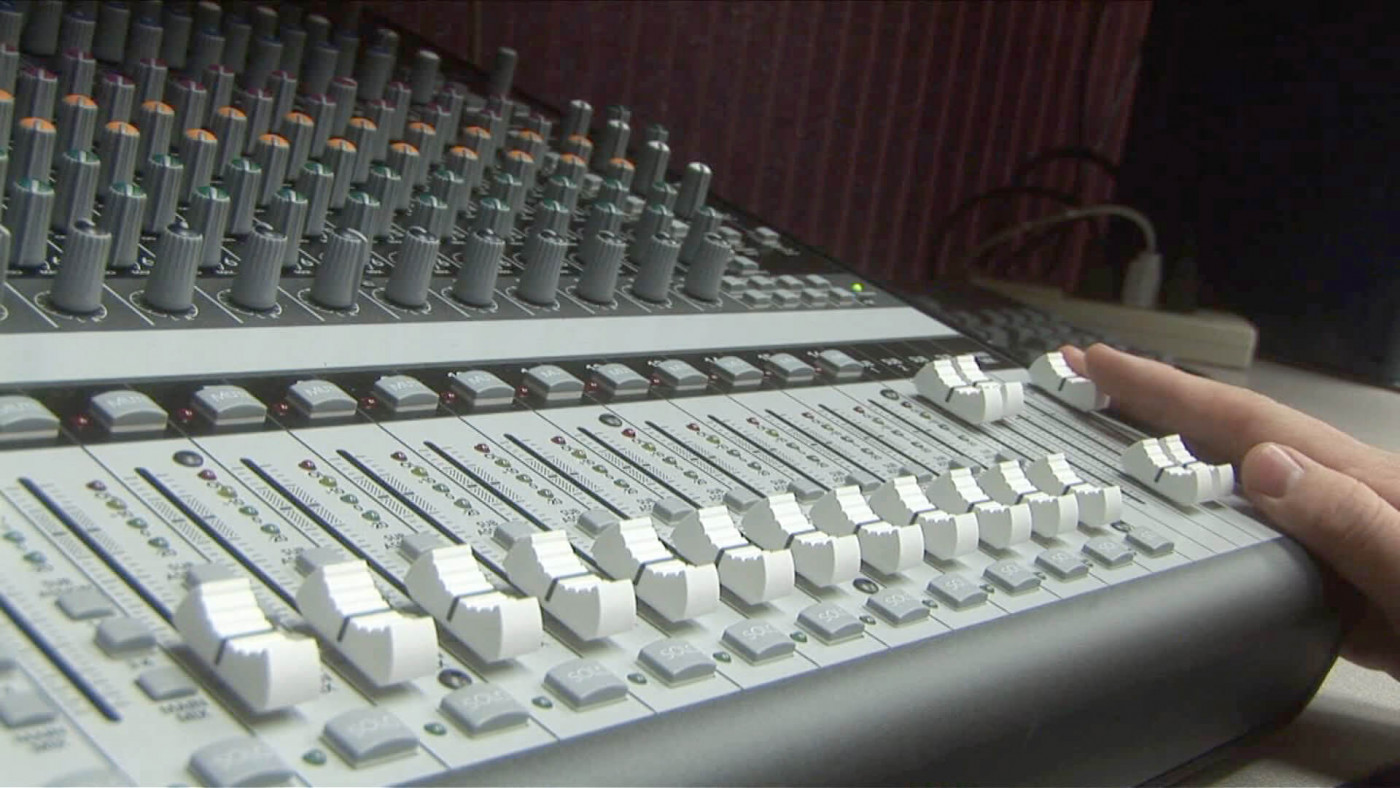 operating a sound board - audio engineering