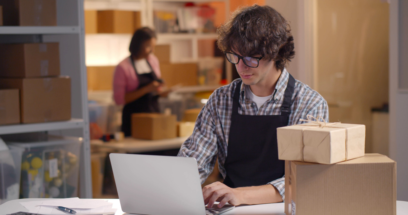 Young male working in purchasing